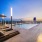 Spacious rooftop pool deck with city view