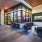 Rooftop lounge with indoor/outdoor bar and social areas