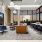 Clubhouse with couch, 8-person dining table, and catering kitchen with indoor/outdoor bar area.