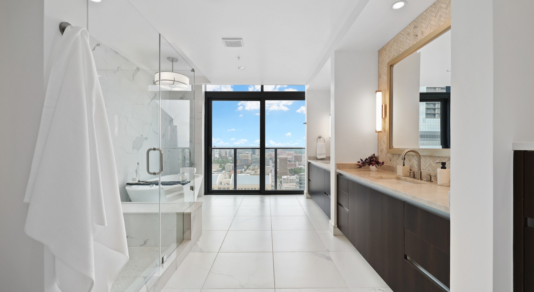 Spacious bathroom with large shower and soaking tub