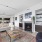 living room photo with gas fireplace and book shelving 
