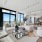 Living room and dining room photo with sectional counch and two chairs