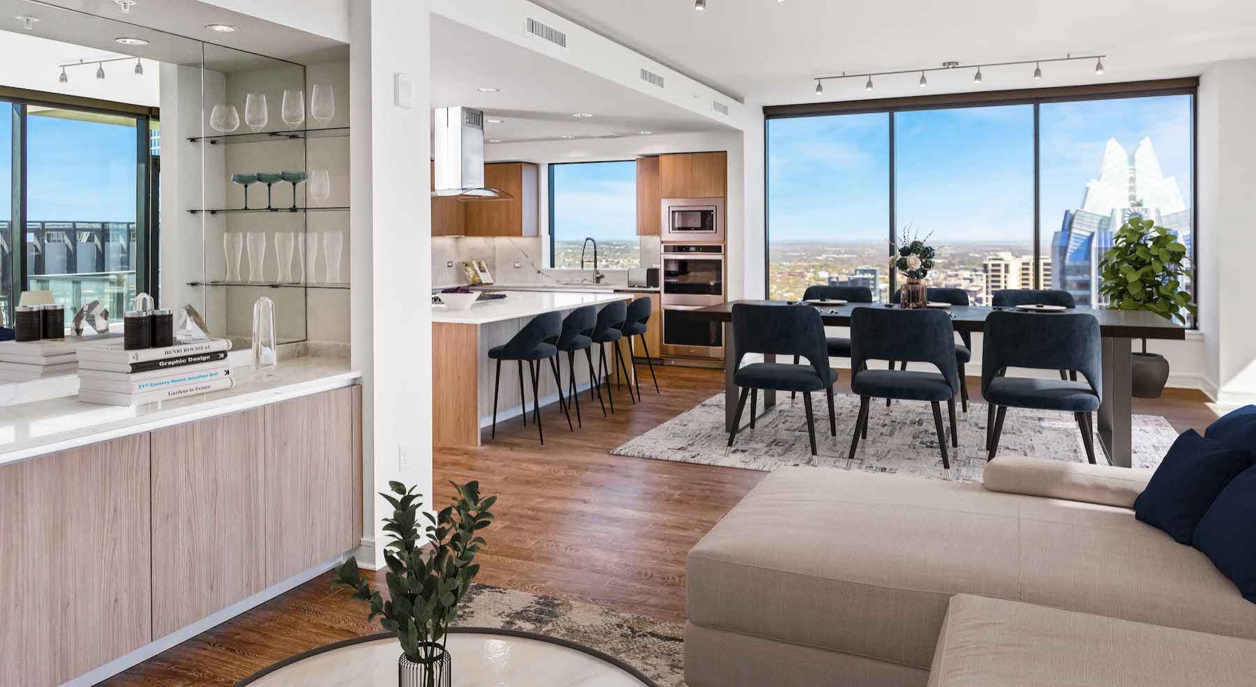 Spacious kitchen with large windows and wood floors