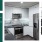 White Frassino Hiello wood cabinets, Angola Black Honed granite counters, Parnon Light white and gray marble backsplash, and dark Charcoal Oak wood-style floors.